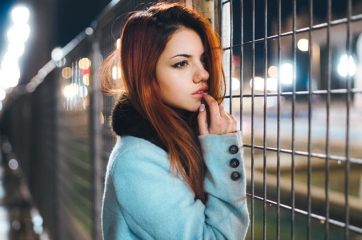 4530070-women-delaia-gonzalez-finger-on-lips-looking-away-redhead-portrait-white-coat.jpg