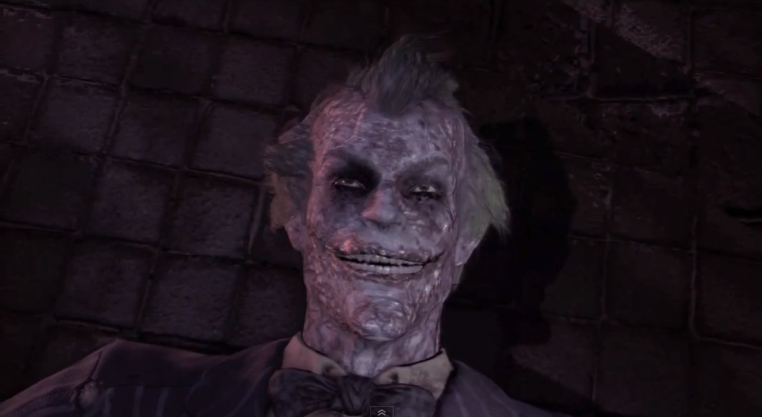 arkham-city-joker-dead-with-a-smile-on-his-face.png